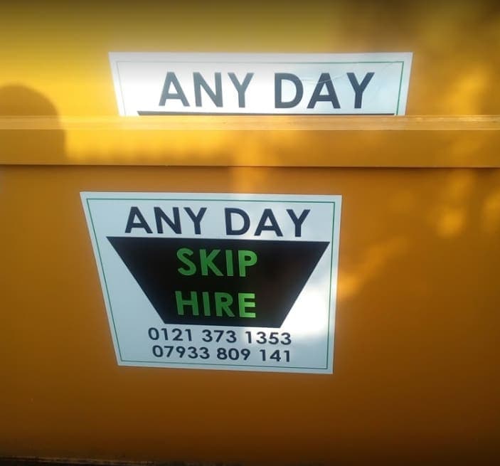 A loaded builders skip ready for collection
